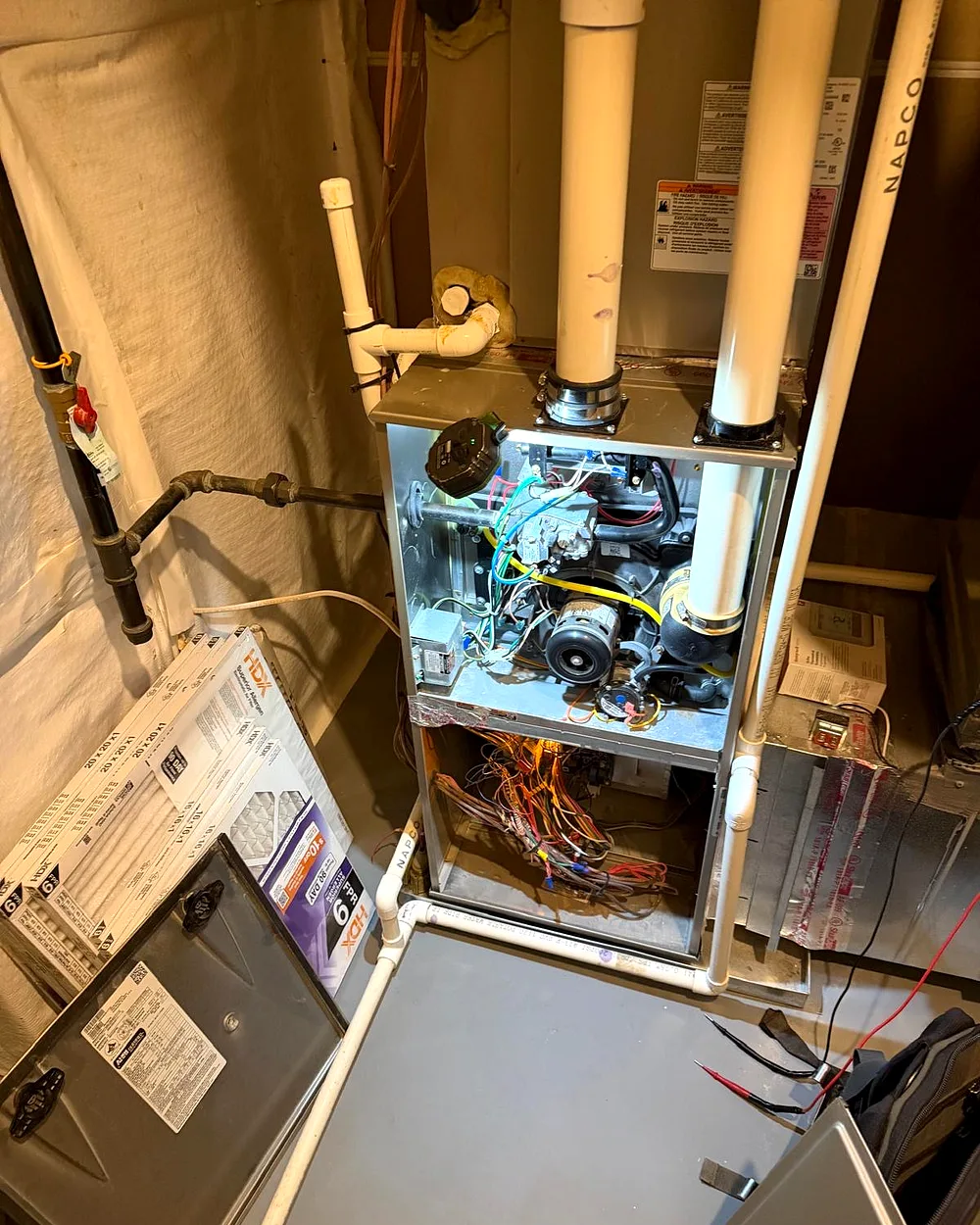 Fresh high-efficiency air filters ready to install in an HVAC system