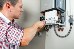 HVAC technician repairing heating system in Ashburn Virginia